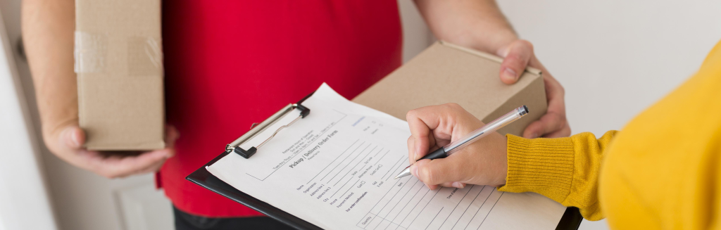 woman-signing-delivery-paper.png
