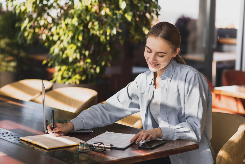 young-woman-writing-clipboard.jpg